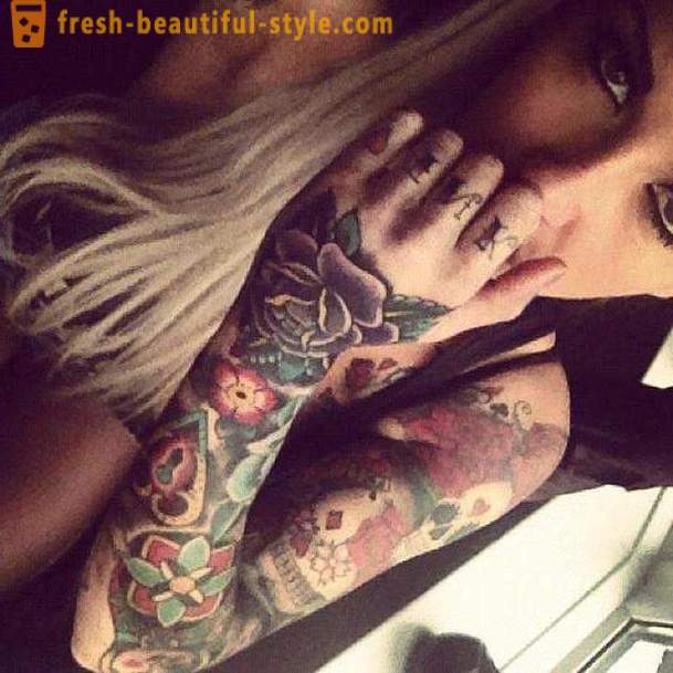 Женска тетоважа на руци: атрактивна израз
